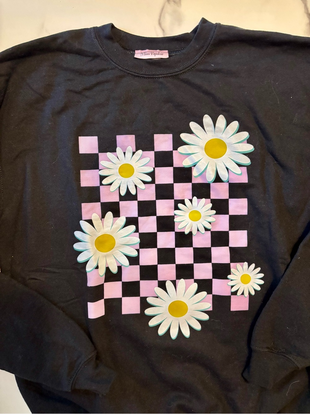 Kids Black Sweatshirt with Pink Checkerboard & Daisy Motif - Junior